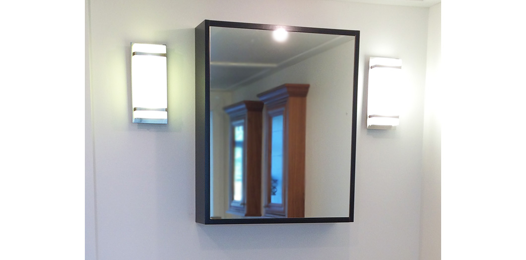 black mirrored medicine cabinet