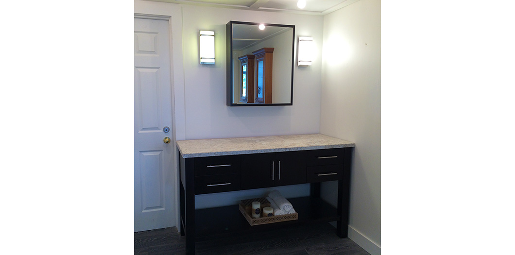 black medicine cabinet with vanity